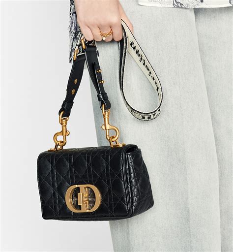 small black dior bag.